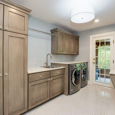 laundry room with access to screened porch