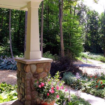 View from front porch with stone pier and wood column