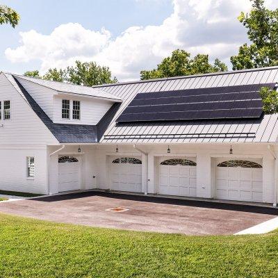 Garage exterior with solar panels on roof