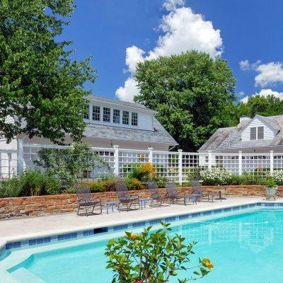 Pool on site next to new and original garages