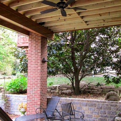 Covered porch area underneath screened porch